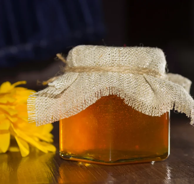 bee-honey-glass-jar-with-cover-burlap-yellow-flowers-dark-background bee-honey-glass-jar-with-cover-burlap-yellow-flowers-dark-background
